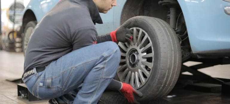 a man Preparing a Vehicle for a Long-Distance Move from Manhattan