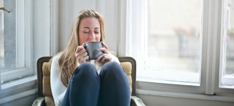 A woman sipping tea