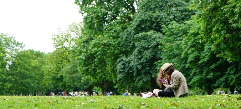 A girl sitting on the grass