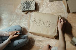 simplify packing and unpacking when moving by labeling a box with BOOKS on it