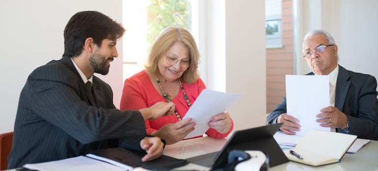 People reviewing documents