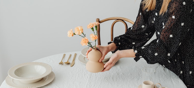 a woman decorating after moving from west village to tribeca