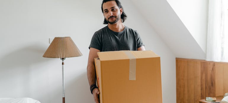 A man carrying a box