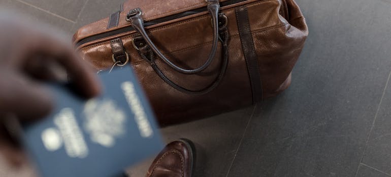 A brown leather travel bag