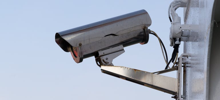 A security camera mounted on a wall