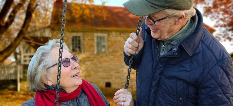 A senior couple looking at each other