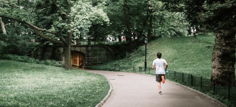 a man running From Upper East Side to Upper West Side