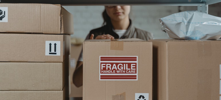 A brown cardboard box with Fragile sticker