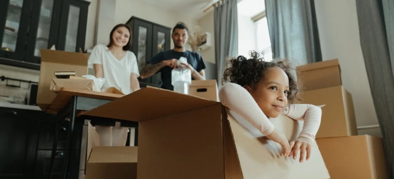 a family embarking on a family move from Wall Street to UES